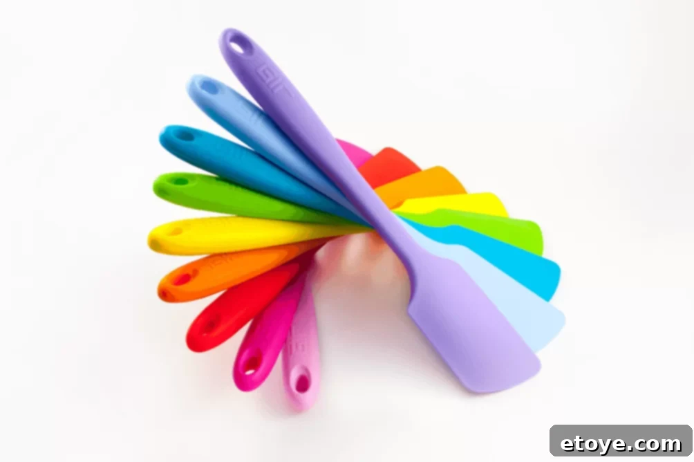 Close-up of GIR Spatula's flexible blade expertly scraping a bowl