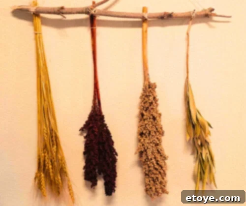 A handcrafted rack made from foraged sticks or branches, adorned with dried herbs or flowers, not only offers a rustic charm to your décor but also a hint of fragrance that gently whispers the earthy tales of autumn.