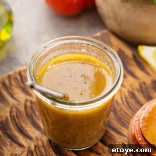 Bold Smoky Sofrito Dressing 4 Smoky Sofrito Vinaigrette in mason jar and wooden background