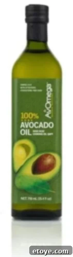 Avocado oil bottle with a green background