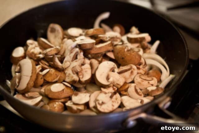 Velvet Boozy Mushroom Sauce 3 Close-up of creamy mushroom sauce in a bowl