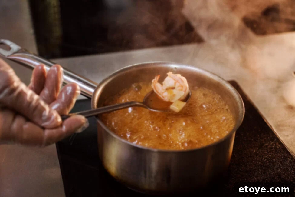 6 Creative Shrimp Recipes 3 Perfectly poached shrimp, pink and curled, ready for a delicious meal.