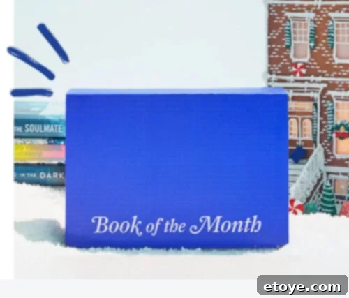 Think Inside The Box Your Essential Subscription Gift Guide 3 A vibrant blue box labeled "Book of the Month" set against an enchanting winter backdrop with snowy buildings and festive decor, hinting at cozy reading experiences and literary adventures.