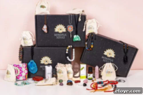 Think Inside The Box Your Essential Subscription Gift Guide 6 An array of calming spiritual and wellness items from Mindful Souls, including crystal jewelry, small drawstring pouches, polished gemstones, and essential oil bottles, all contributing to a sense of serenity and personal growth.
