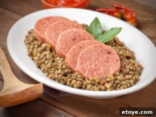 10 Global Dishes for New Year Good Fortune 6 Traditional Italian New Year's dish Cotechino con Lenticchie, featuring sausage and lentils