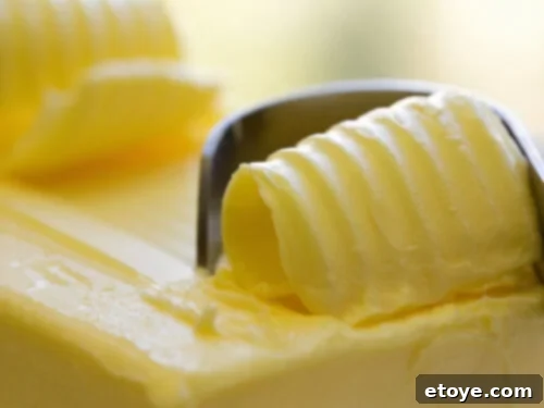 Butter scooped into rolls