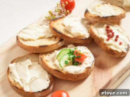 Appetizer of cream cheese and garnish on small pieces of toast