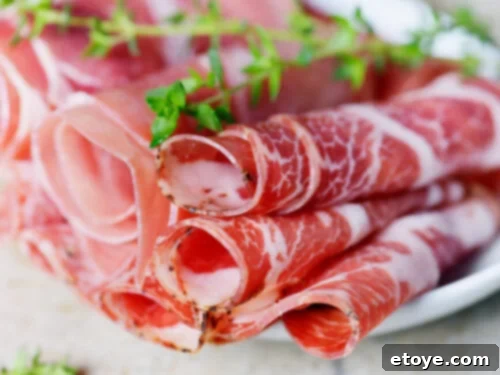 How Long Your Lunch Meat Stays Fresh in the Fridge 2 Rolled deli meats on a platter