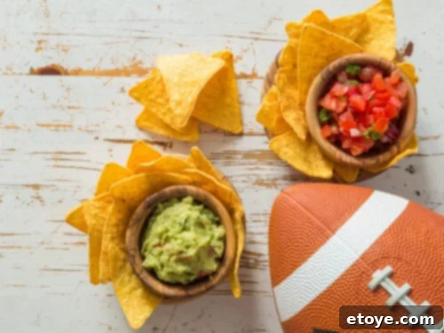Touchdown Nachos: 8 Recipes to Win Over Your Super Bowl Crowd 2 Nachos are a classic Super Bowl dish, perfect for game day parties.