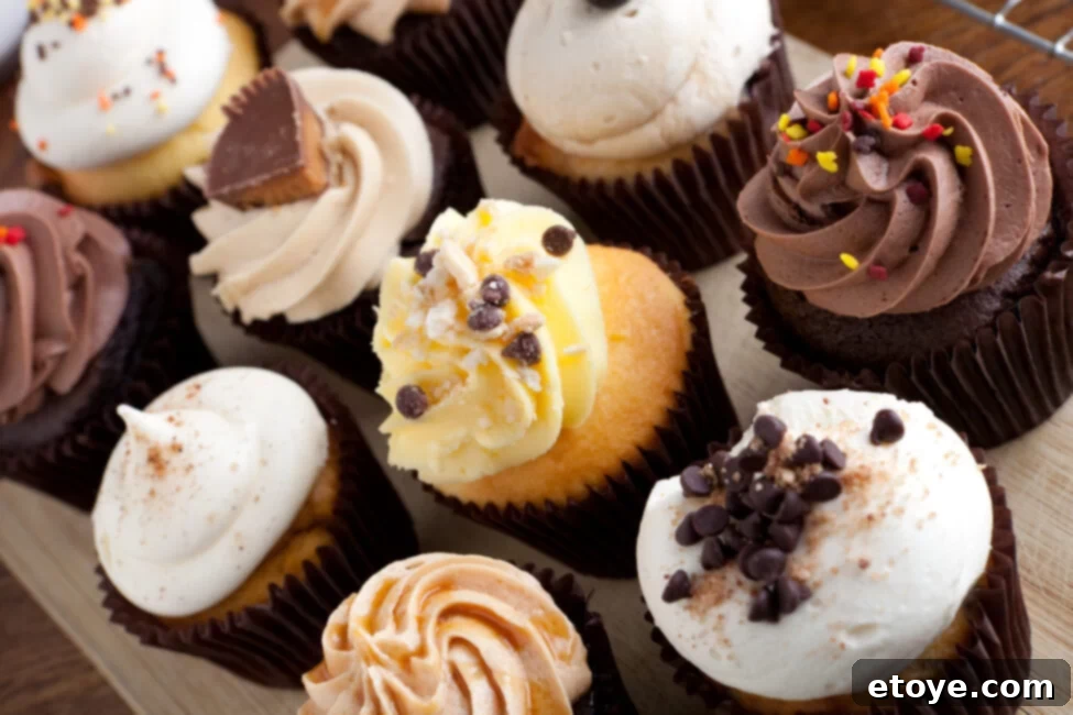 Fridge or Counter The Ultimate Cupcake Storage Guide 3 Variety of cupcakes with colorful frosting on a tray