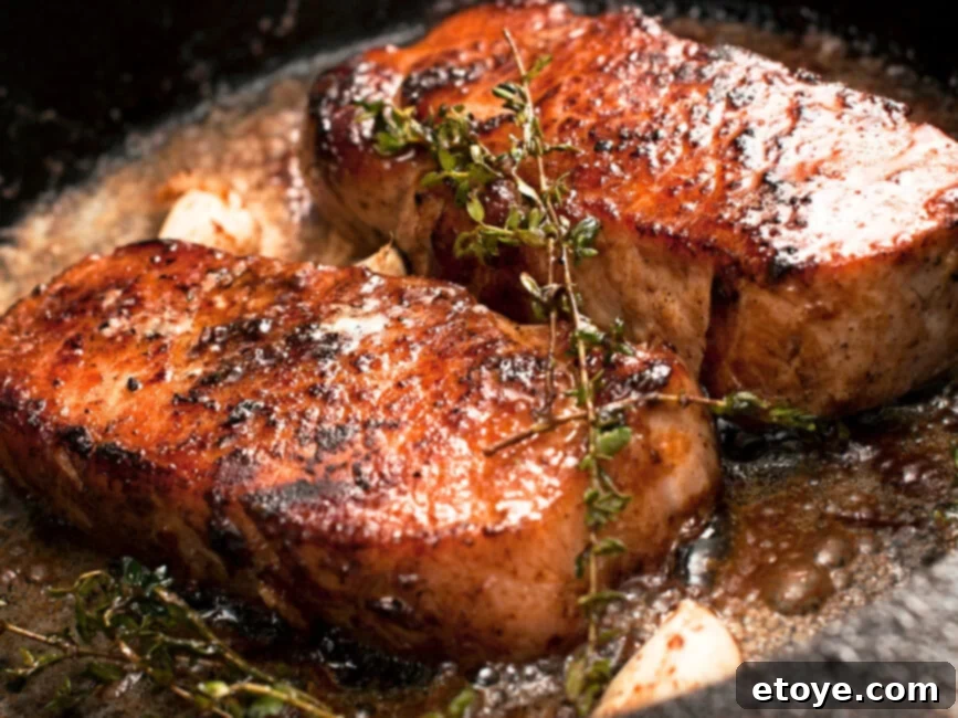 Perfectly pan-fried pork chops with a golden crust
