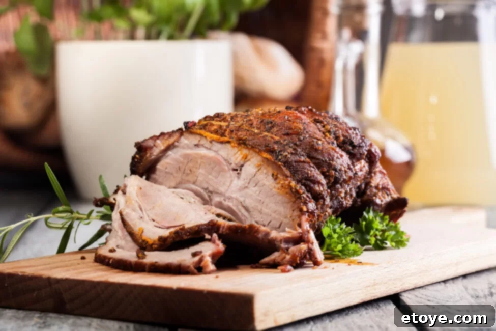 Various cuts of pork cooking in the oven