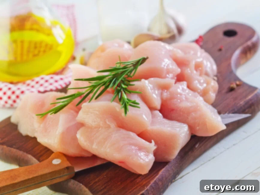 Safely Defrost Chicken in Your Microwave 6 Collection of chicken pieces and cooking ingredients on a kitchen counter
