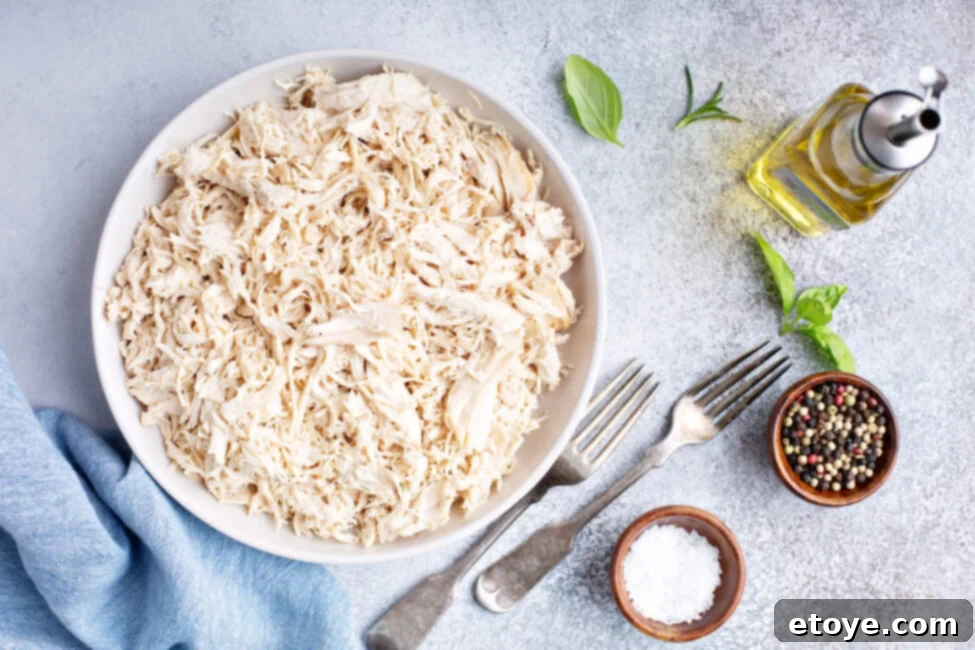 Shredded chicken in a glass container
