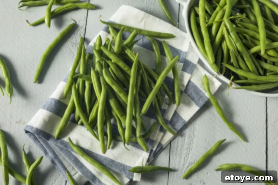 Frozen green beans on a baking sheet