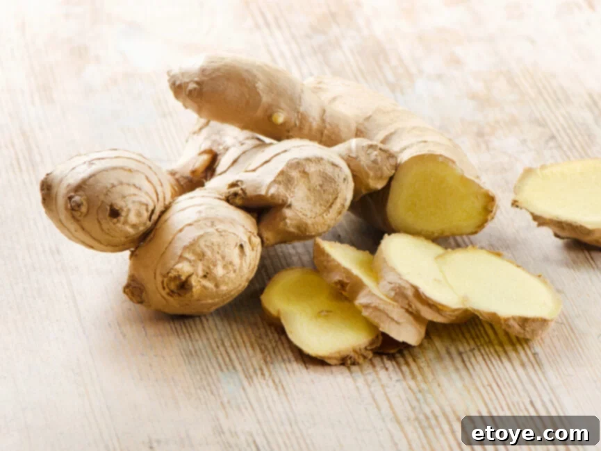 Ginger Freshness Fridge and Freezer Storage 3 A close-up view of multiple fresh ginger roots, highlighting their texture and color.