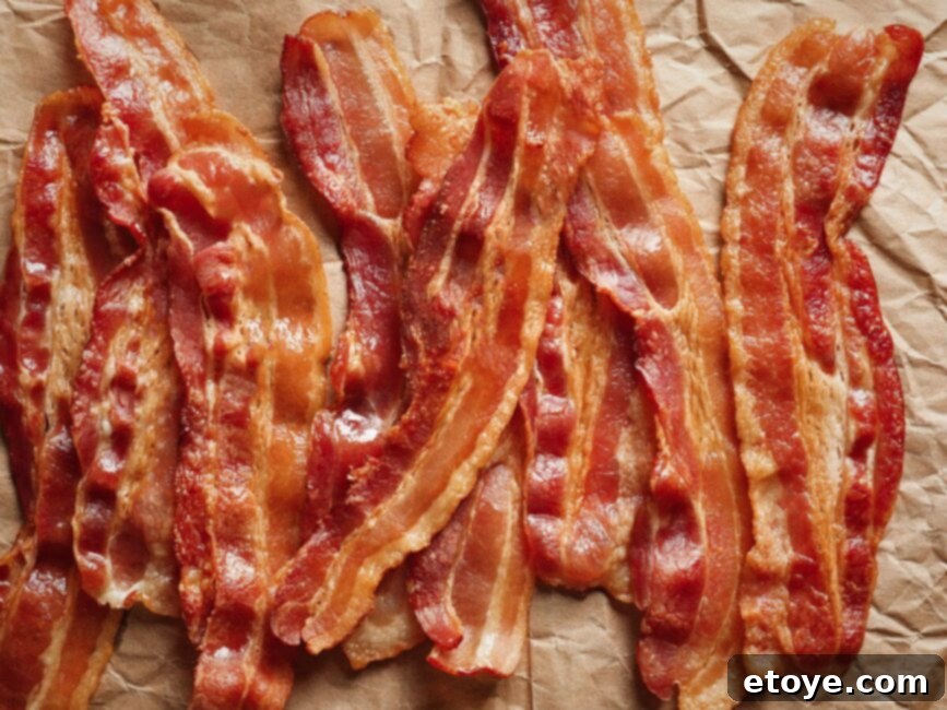 Shelf Life of Refrigerated Bacon 2 Image of bacon strips in an opened package