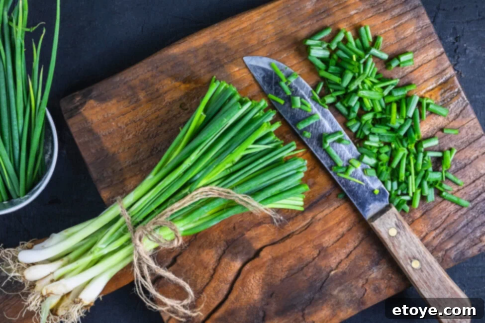 Maximize Green Onion Freshness in the Fridge 4 Various methods of storing green onions, including a jar of water, wrapped in paper towels, and chopped in a freezer bag.