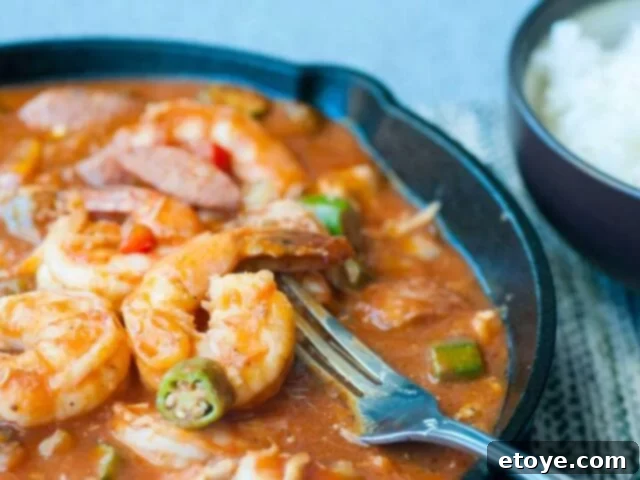Top 5 Online Cooking Programs to Master Your Kitchen Skills 4 A vibrant bowl of classic Cajun seafood gumbo, ready to be taught in an online cooking class.