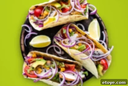 Top 5 Online Cooking Programs to Master Your Kitchen Skills 7 A colorful array of authentic Mexican dishes like tacos and churros, featured in an online cooking class.