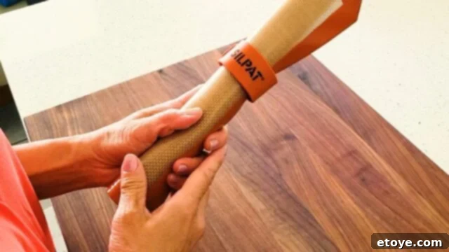 Silpat's Sil Band for rolling up your mats