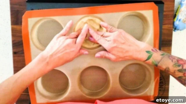 Filling my Silpat mold with sugar cookie dough