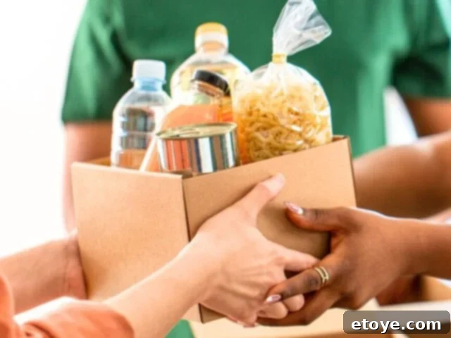 Beat the Rut: 3 Steps to Reignite Your Drive and Find Your Spark 4 A person extending a hand with a small act of kindness, symbolizing the ignition of connection and spreading joy.