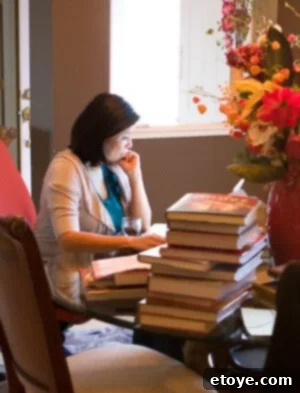 Jaden at her very first cookbook signing event, interacting with enthusiastic readers and signing copies of The Steamy Kitchen Cookbook.