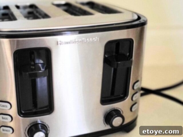 Get a Spotless Toaster Fast and Effortlessly 12 Close-up of a toaster's slots, showcasing its clean interior after maintenance