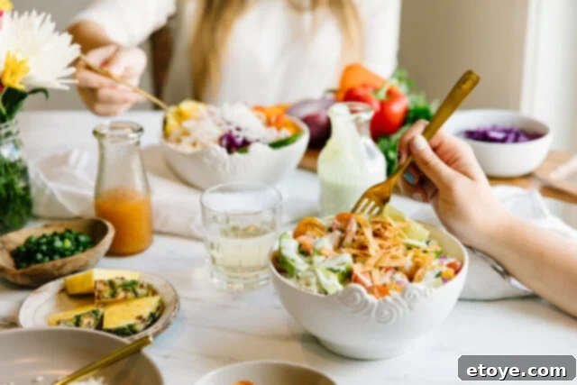 Vibrant Buddha Bowl served on a wooden table, showcasing fresh vegetables and healthy ingredients