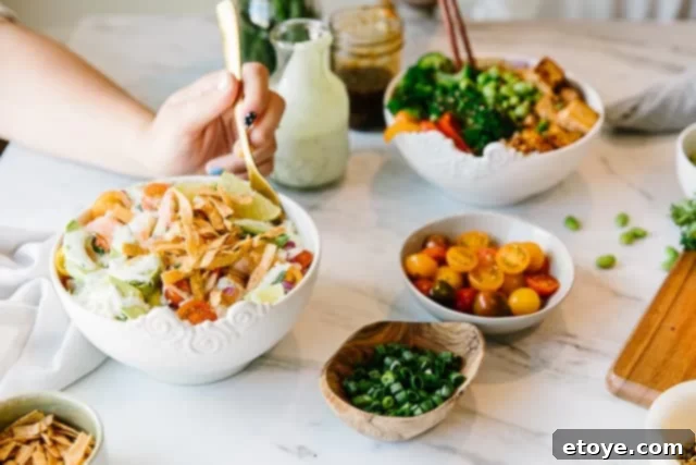 Collection of diverse and colorful Buddha Bowls, each with unique healthy ingredients and dressings