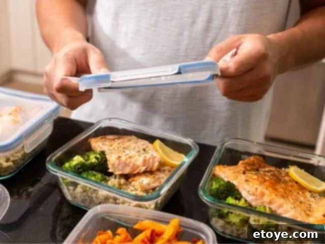 Various meal prep containers with healthy food portions