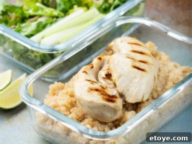 Prepared chicken and rice meal prep in containers