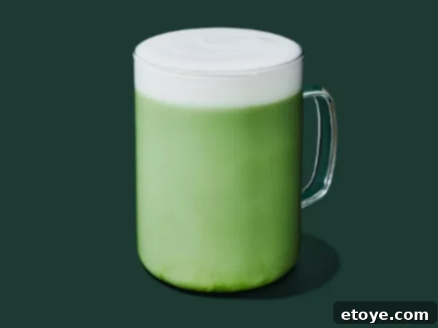 Starbucks Green Tea Matcha Latte Ingredients 3 A warm Starbucks matcha latte, artfully crafted with frothy milk, served in a classic Starbucks cup.