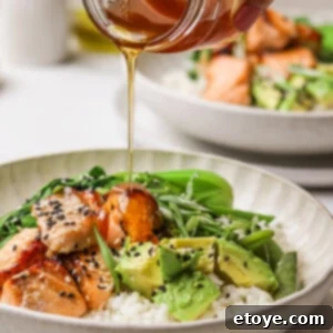 Spicy Honey Glazed Crispy Salmon Bowl 13 Hot Honey Salmon Bowl with honey drizzle