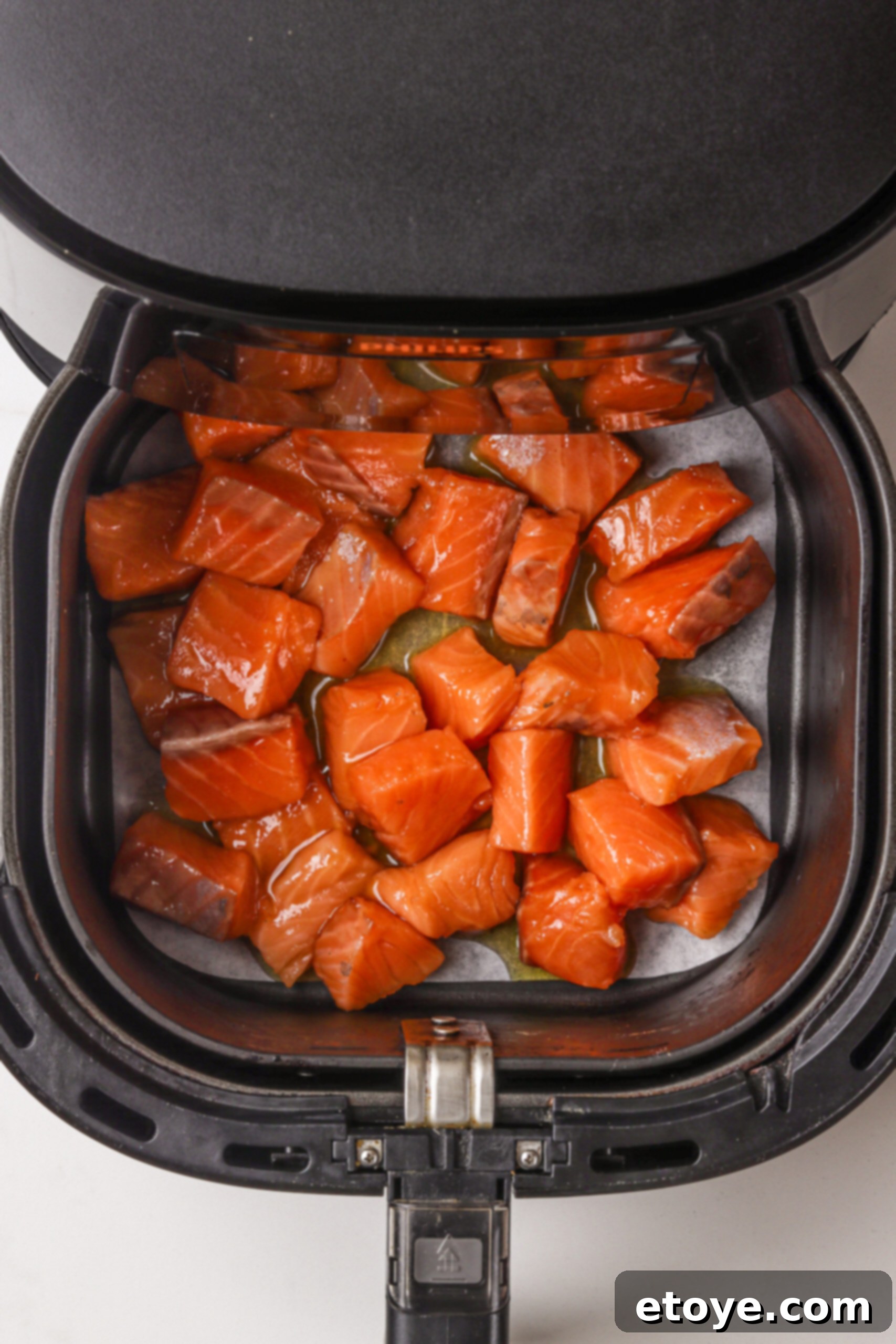 Spicy Honey Glazed Crispy Salmon Bowl 7 Preparing salmon for air fryer