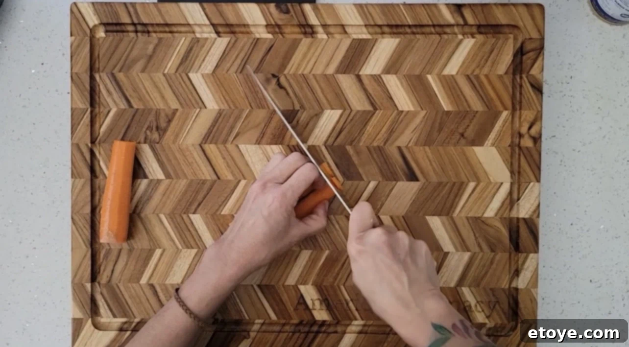 Cuttingboard.com Teak Herringbone Cutting Board: A Detailed Review 4 Cuttingboard.com Teak Herringbone Chopping Carrots