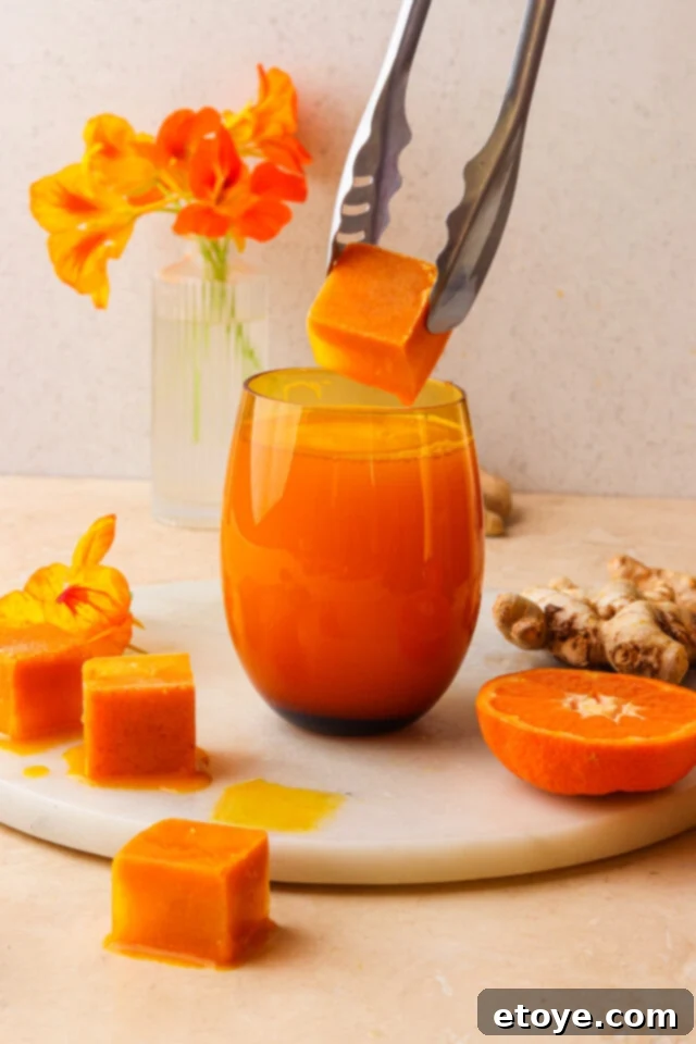 Mind, Body, and Immunity Boosting Ice Cubes 2 Ginger Immunity ice cubes in a glass