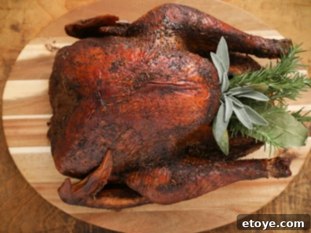 thanksgiving turkey on a cutting board, ready for carving