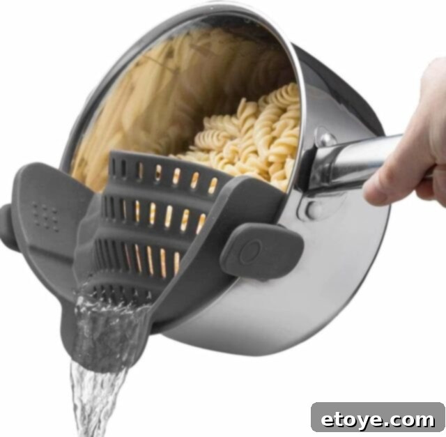 Top 10 Kitchen Gadgets to Revolutionize Your Cooking in 2024 7 Kitchen Gizmo Snap N' Strain Pot Strainer for easy draining