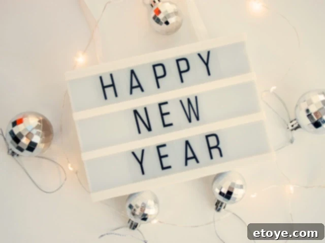 happy new year sign with festive decorations