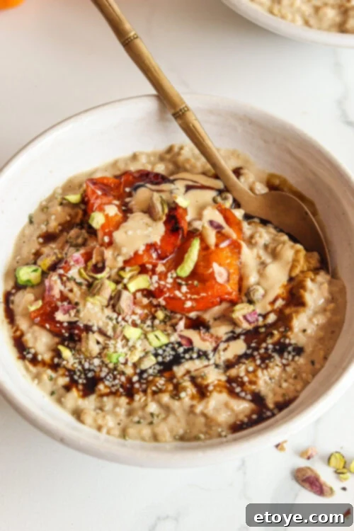 Adaptogen-Boosted Roasted Apricot Oatmeal 3 Roasted Apricot Adaptogenic Oatmeal with vibrant toppings