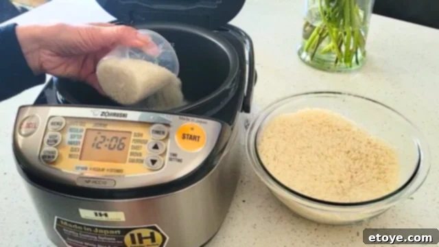 Zojirushi NP-HCC10 The Best Rice Cooker Evaluated 5 Cooked rice steaming in the Zojirushi rice cooker, perfectly fluffy