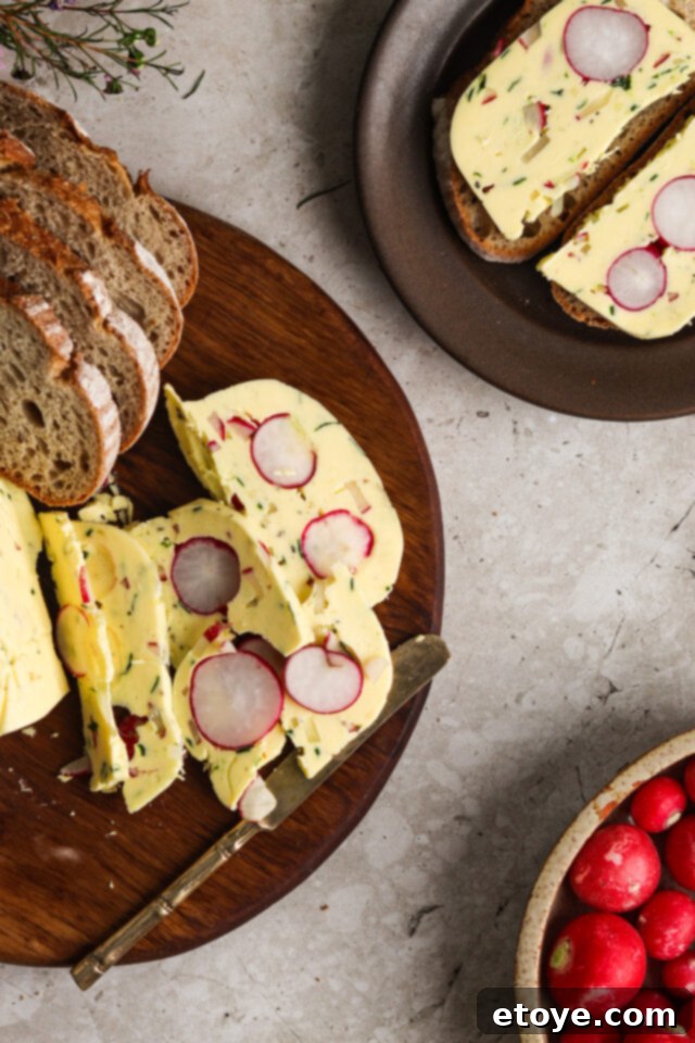 Radish and herb butter terrine sliced, showcasing the vibrant layers