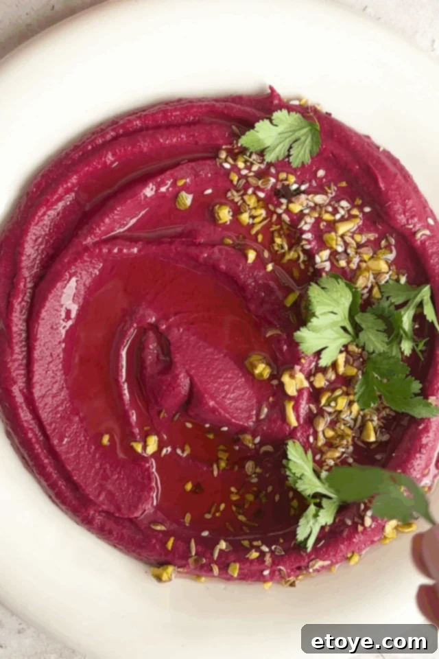 Crafting Purple Sweet Potato and Ginger Hummus 5 Beautifully plated Purple Sweet Potato Hummus, garnished and ready to be served