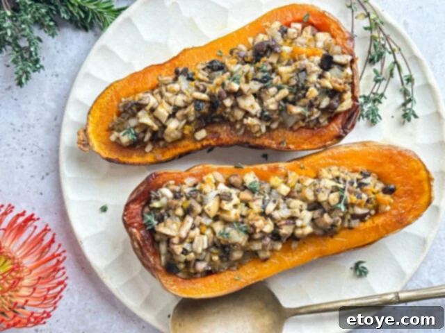 Close-up of wild mushroom and sage stuffed butternut squash, showing texture.