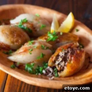 Golden Lebanese Stuffed Onions 2 A dish of beautifully golden Lebanese Roasted Stuffed Onions.