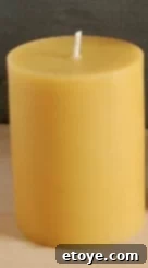 Maple syrup being poured, showcasing its rich, dark color.