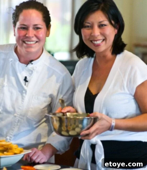 Collaborative Cooking with Stephanie Izard at Club Med Stephanie Izard and Jaden working together on a culinary dish during a cooking lesson at Club Med.