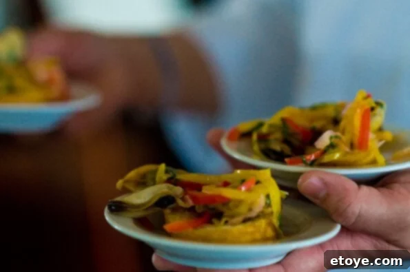 Stephanie Izard's Steamed Mussel and Fennel Escabeche Dish A beautifully plated serving of Stephanie Izard's Steamed Mussel and Fennel Escabeche with bruschetta.
